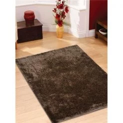 Jensendistributionservices 6 x 9 ft. Hand Tufted Shag Polyester Solid Rectangle Area Rug; Brown